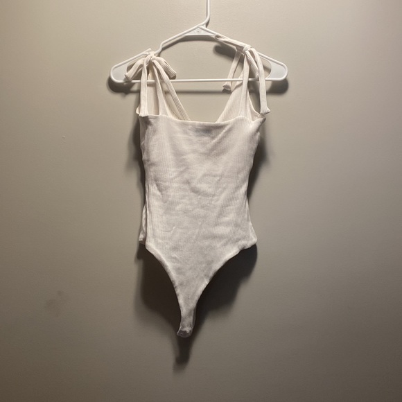 Petal and pup white body suit. - Picture 2 of 2